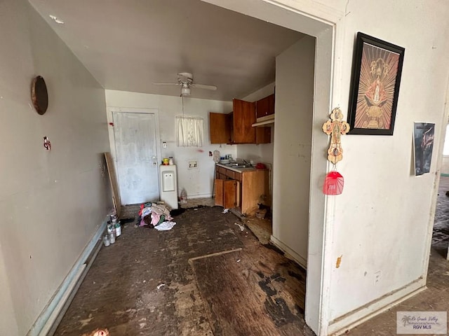 kitchen with ceiling fan and sink