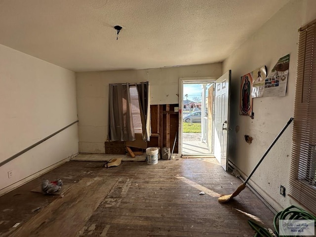 misc room with a textured ceiling