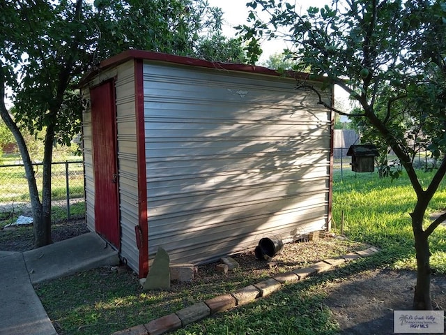 view of home's exterior with a shed