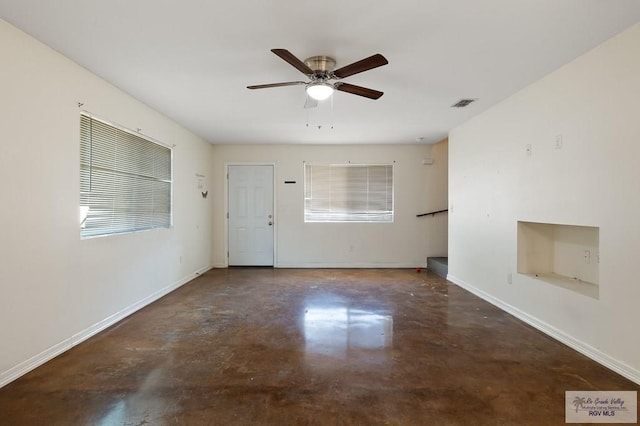 spare room featuring ceiling fan