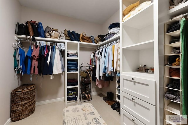 9470 Cajun, Los Fresnos, TX 78566 - spacious closet featuring light tile patterned flooring