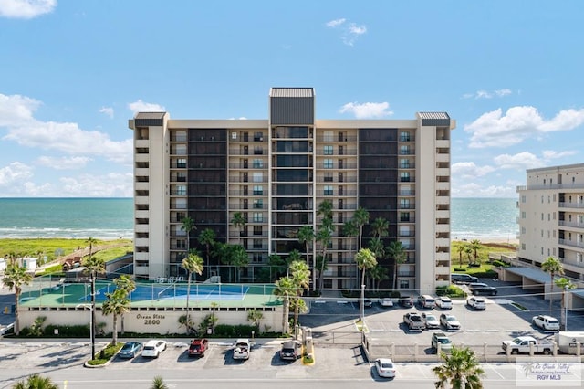 view of building exterior featuring a water view