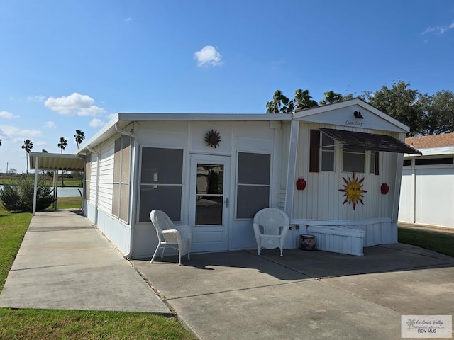 manufactured / mobile home with a patio area