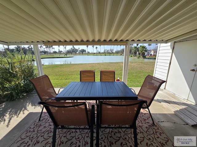 view of patio / terrace with a water view