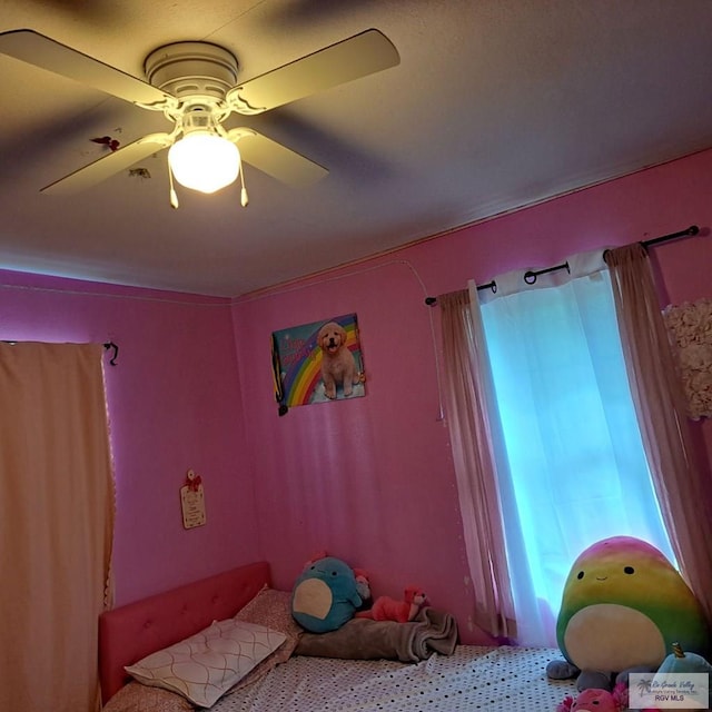 bedroom featuring ceiling fan