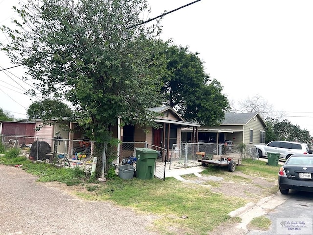 view of front of house with fence