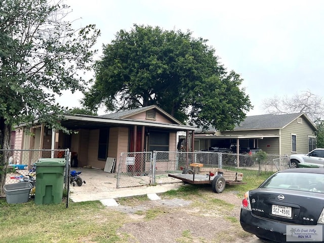 view of front of house with fence