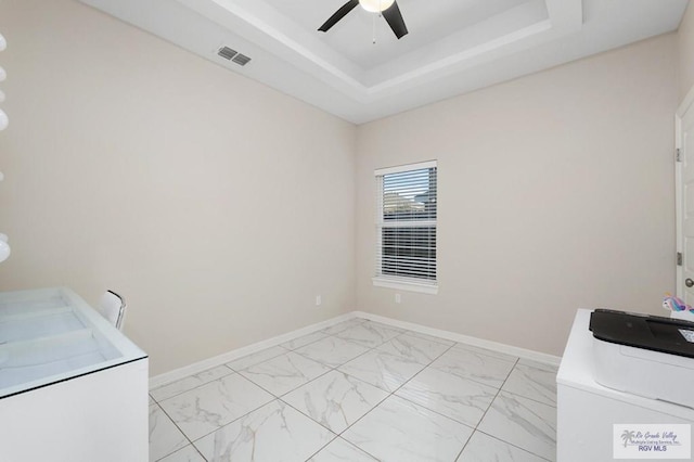 1903 W Webster Dr, Edinburg, TX 78542 - laundry room featuring washing machine and dryer, ceiling fan, and light marble finish flooring