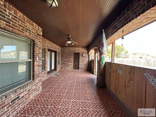 view of patio / terrace featuring ceiling fan