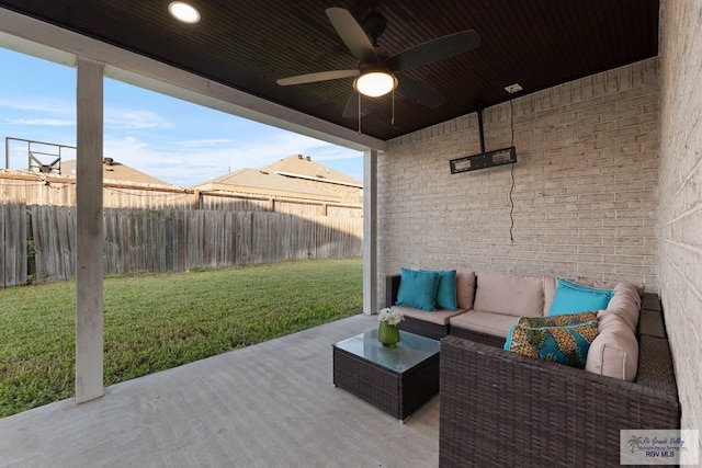 view of patio featuring an outdoor hangout area and ceiling fan