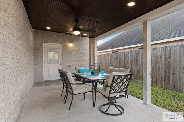 view of patio featuring ceiling fan