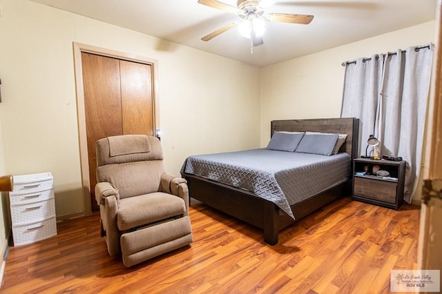 2401 E Austin Ave, Harlingen, TX 78550 - bedroom with light wood-style floors and ceiling fan