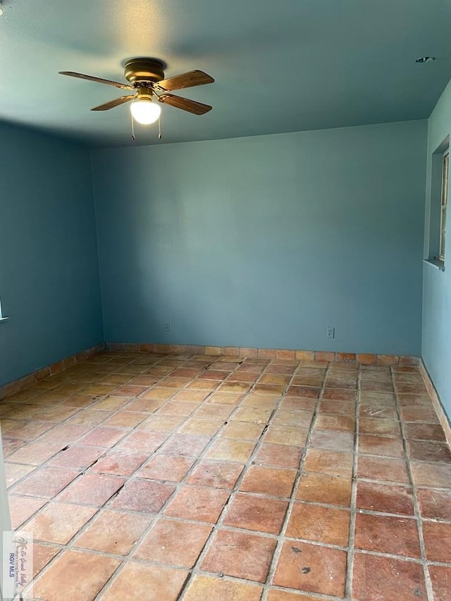 empty room featuring ceiling fan