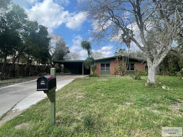 ranch-style house with a front lawn and a carport