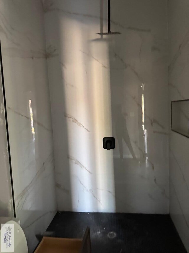 bathroom with walk in shower