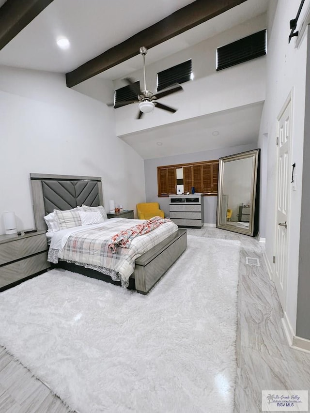 bedroom with beam ceiling and ceiling fan