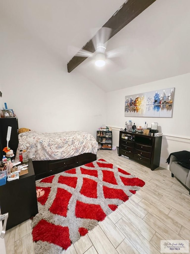 bedroom featuring lofted ceiling with beams and ceiling fan