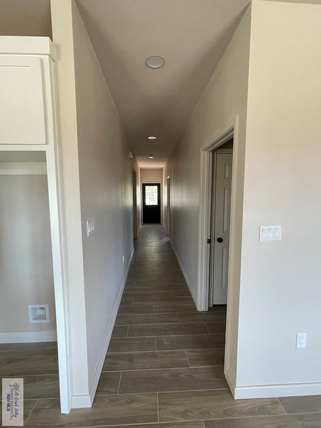 705 W Matz Ave, Harlingen, TX 78550 - corridor with dark wood-type flooring and recessed lighting