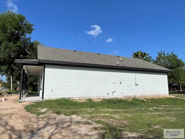 705 W Matz Ave, Harlingen, TX 78550 - back of house with a lawn and a shingled roof