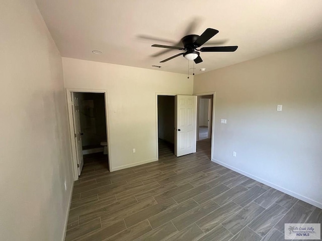 705 W Matz Ave, Harlingen, TX 78550 - unfurnished bedroom featuring dark wood finished floors and ceiling fan