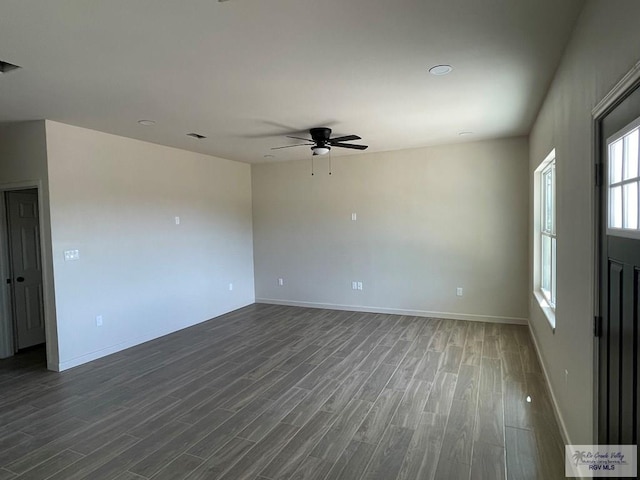 705 W Matz Ave, Harlingen, TX 78550 - spare room featuring dark wood-style floors and ceiling fan