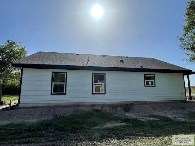 705 W Matz Ave, Harlingen, TX 78550 - rear view of house featuring a shingled roof