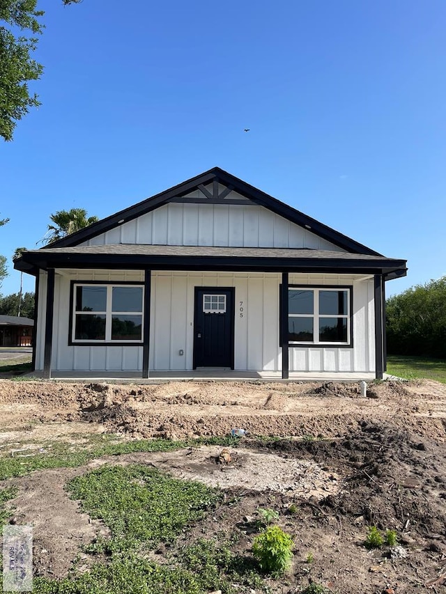 705 W Matz Ave, Harlingen, TX 78550 - view of front of property with covered porch and board and batten siding