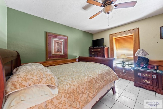 34390 Fm 732, San Benito, TX 78586 - bedroom with a textured ceiling and ceiling fan