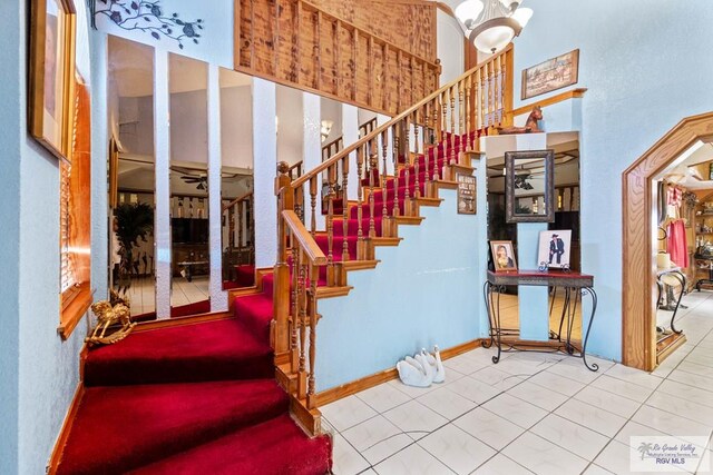 34390 Fm 732, San Benito, TX 78586 - stairway featuring tile patterned flooring and baseboards