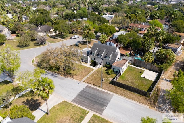 birds eye view of property with a residential view