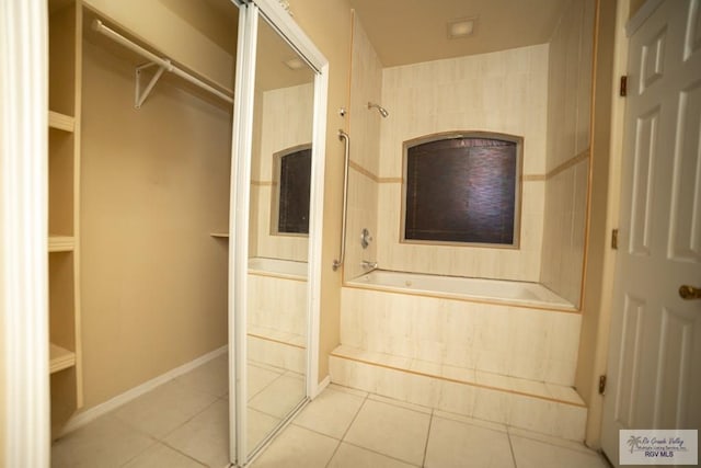 interior space with tile patterned flooring and plus walk in shower