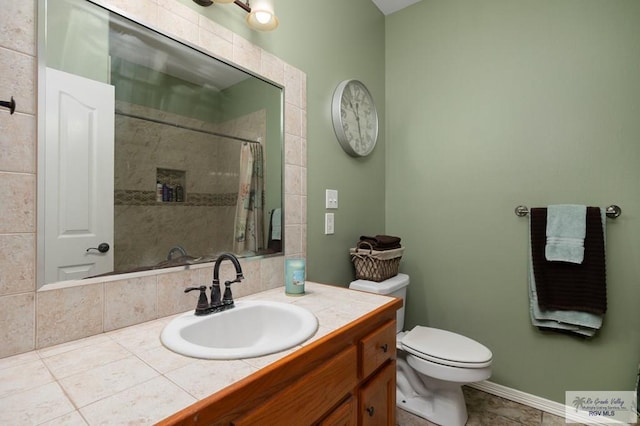 bathroom with walk in shower, tile patterned floors, vanity, and toilet