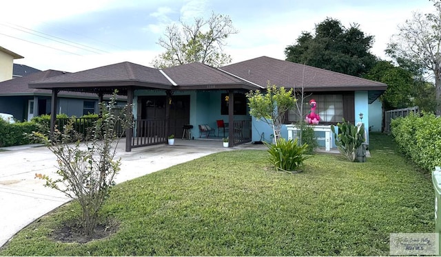 single story home with a carport and a front lawn