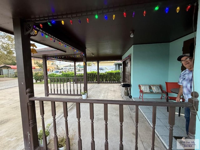 view of patio featuring grilling area and covered porch