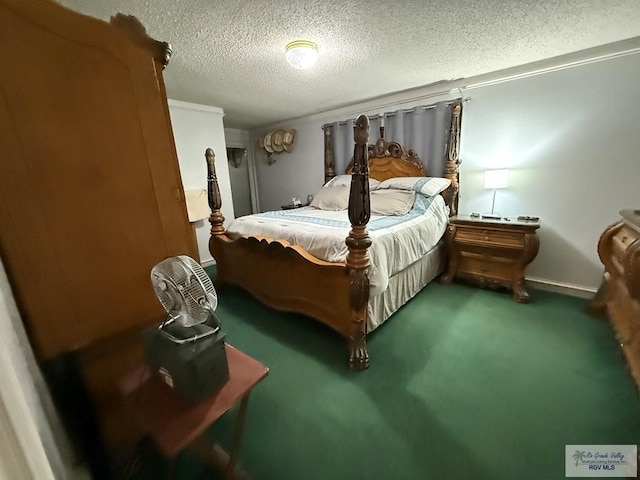 carpeted bedroom with a textured ceiling