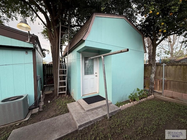 view of outdoor structure featuring central AC