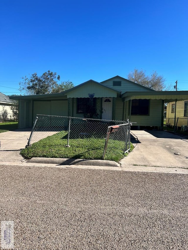 view of front of house featuring a carport