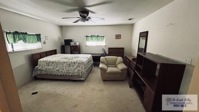 1330 Reagan St Unit 3, San Benito, TX 78586 - carpeted bedroom featuring ceiling fan