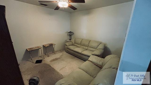 1330 Reagan St Unit 3, San Benito, TX 78586 - living area with a ceiling fan and carpet