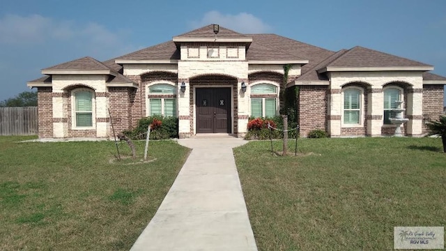 view of front of home with a front lawn