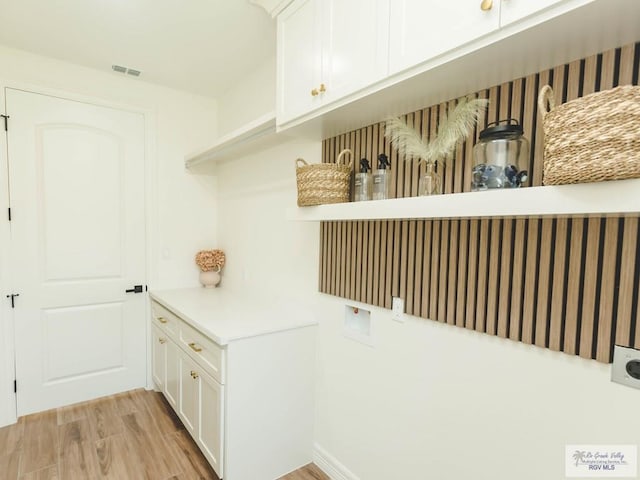 23100 Hidalgo Ave, Harlingen, TX 78552 - mudroom with light wood-style floors