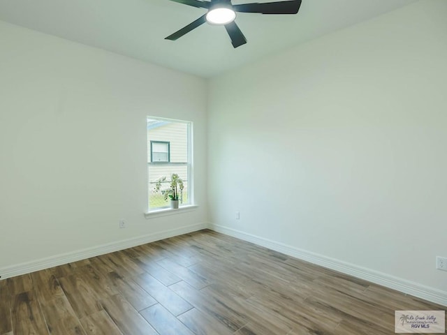 23100 Hidalgo Ave, Harlingen, TX 78552 - unfurnished room featuring ceiling fan, wood finished floors, and baseboards