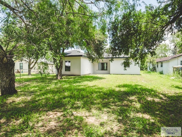 23100 Hidalgo Ave, Harlingen, TX 78552 - back of house with stucco siding