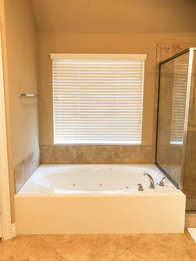 bathroom featuring shower with separate bathtub and tile patterned floors