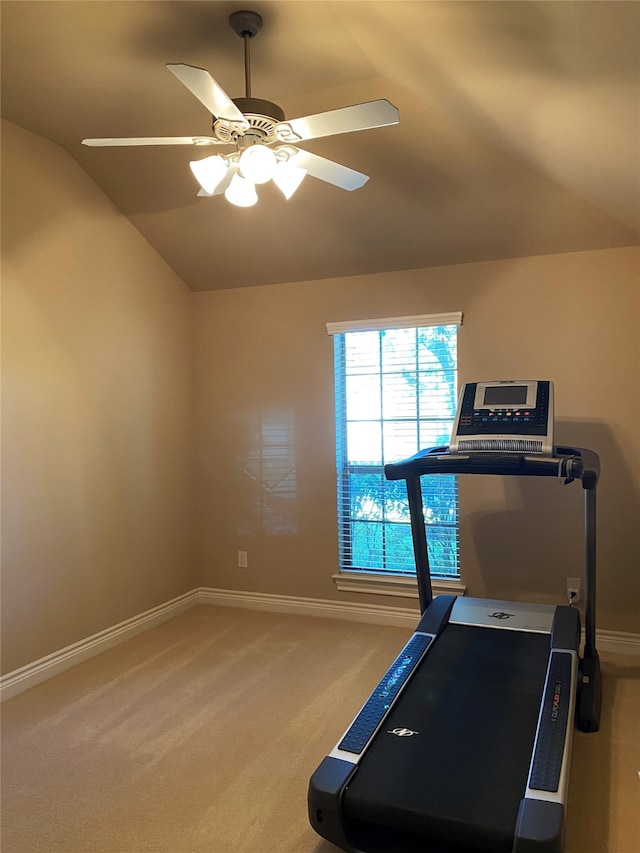 workout area with carpet, vaulted ceiling, and ceiling fan