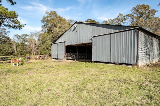 view of outdoor structure with a yard