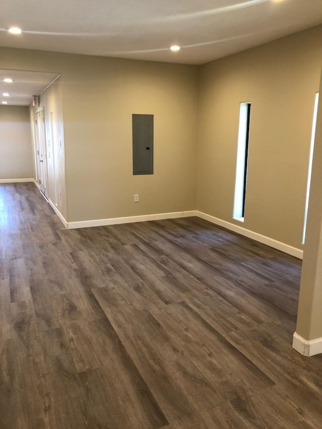 spare room featuring dark hardwood / wood-style flooring