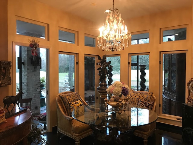 dining area featuring an inviting chandelier