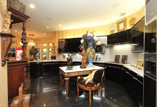 kitchen with dishwasher, hanging light fixtures, dark tile patterned flooring, and stainless steel gas cooktop