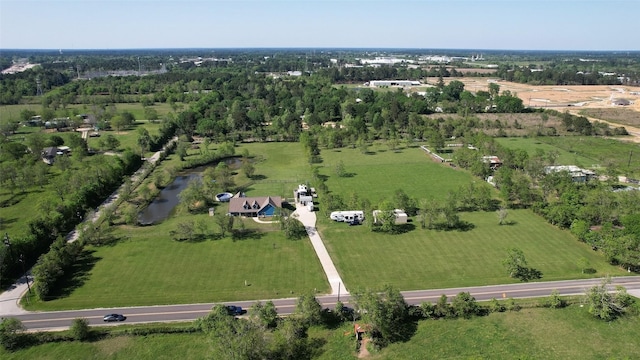 birds eye view of property featuring a rural view